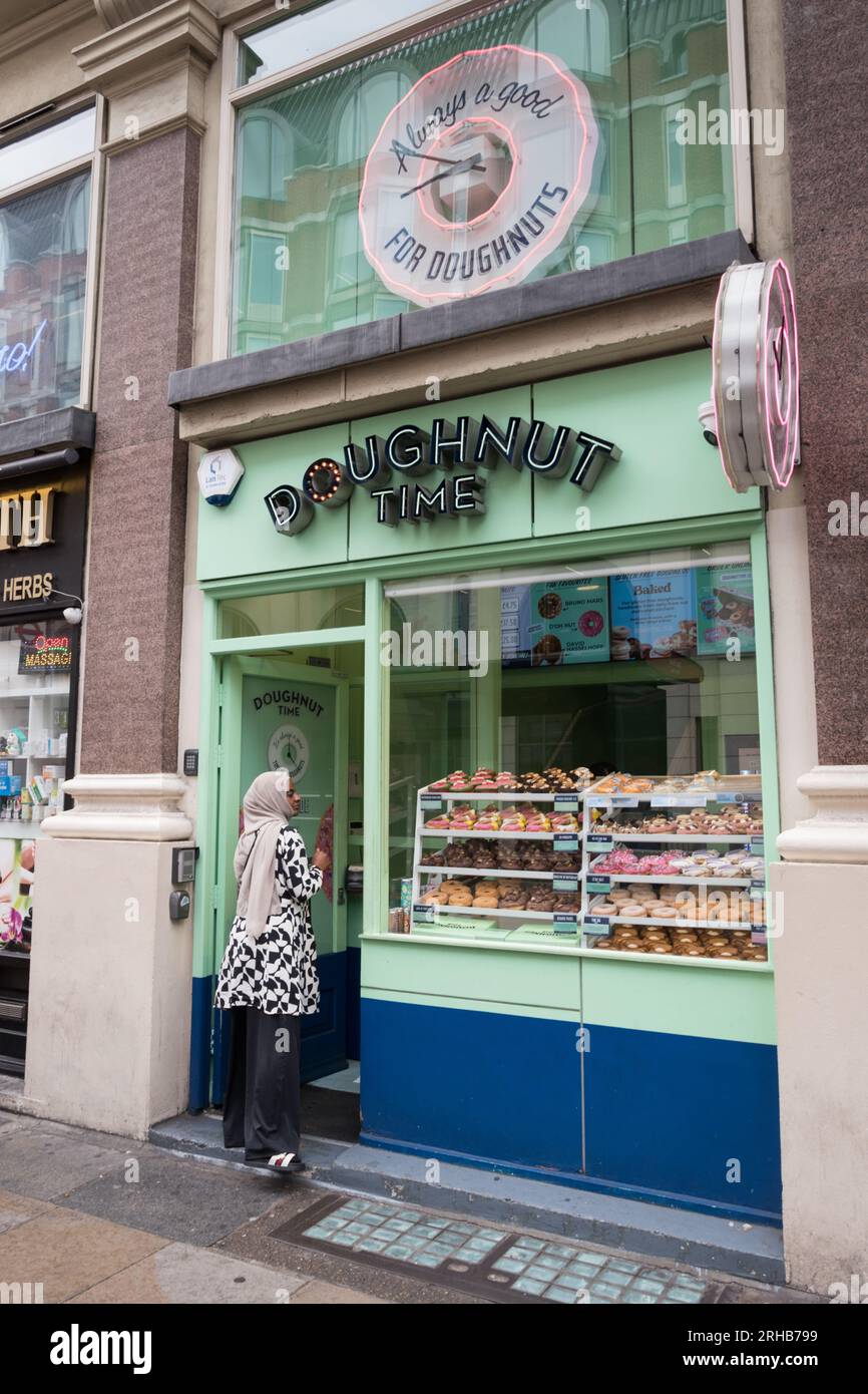 Doughnut Time shop window on Shaftesbury Avenue, London, England, U.K. Stock Photo