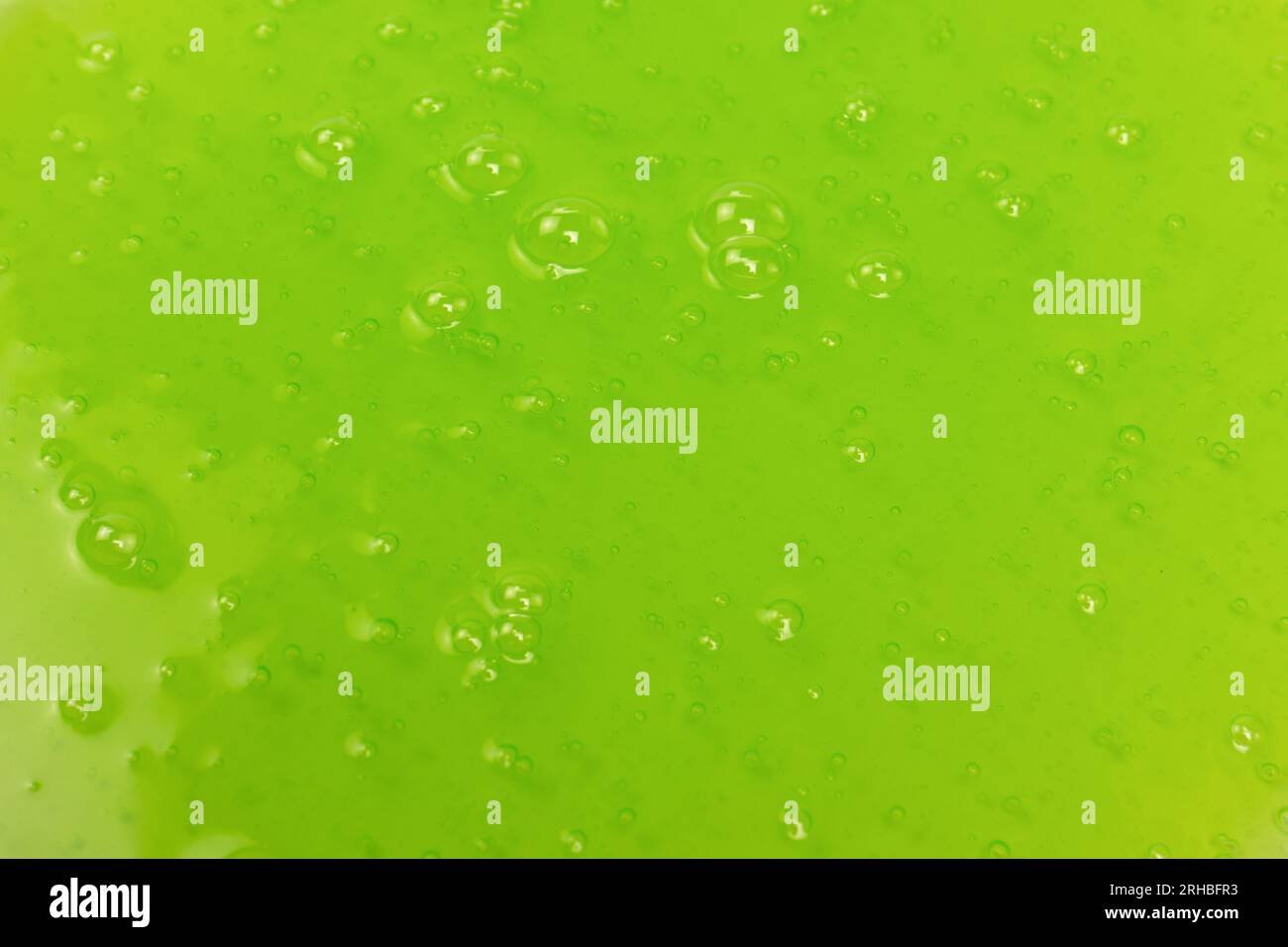 Green slime toy as a background. Top view Stock Photo - Alamy