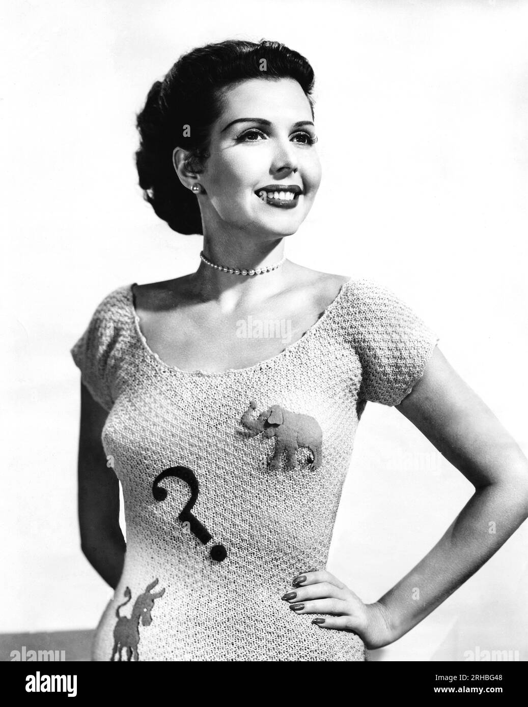 Hollywood, California: July 9, 1952 Actress and dancer Ann Miller displays her dilemma with the Democrats and Republicans this election year. Stock Photo