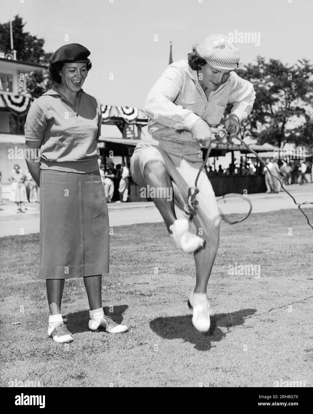 United States: c. 1950 Babe Didrikson attacking a piece of rope Stock ...