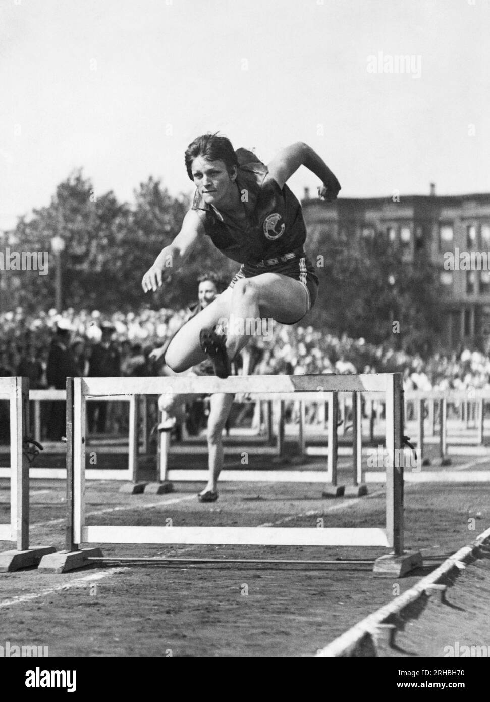 Jersey City, New Jersey:  July 25, 1931 Mildred 'Babe' Didrikson on her way to setting the women's world's record in the 80 meter high hurdles at the ninth annual AAU track and field championship. Stock Photo