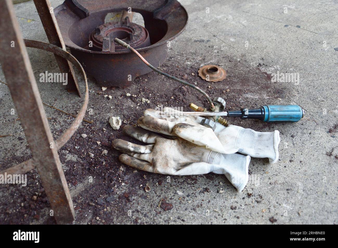 Scrub rusted steel that is stuck. Stock Photo