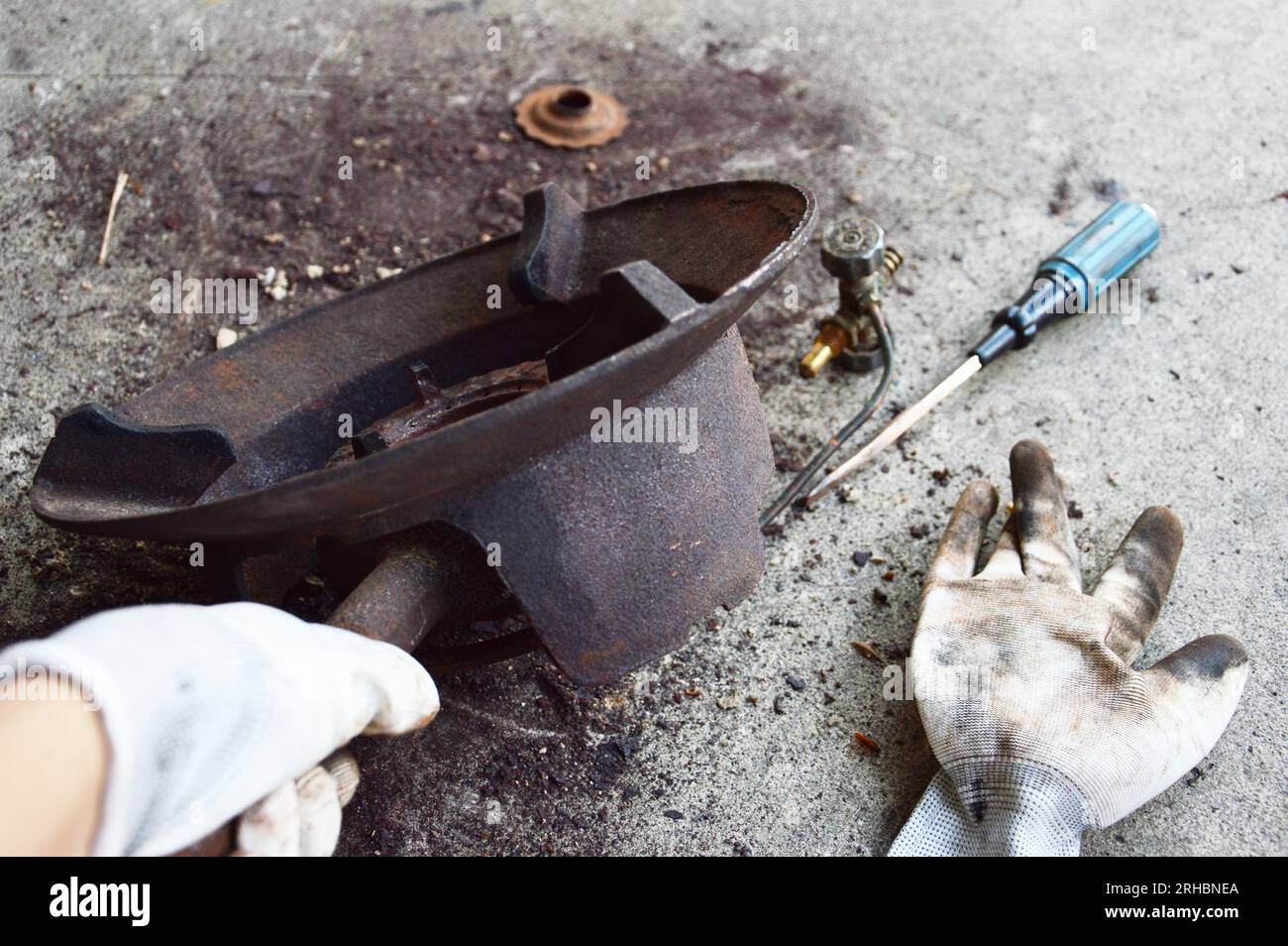 Scrub rusted steel that is stuck. Stock Photo