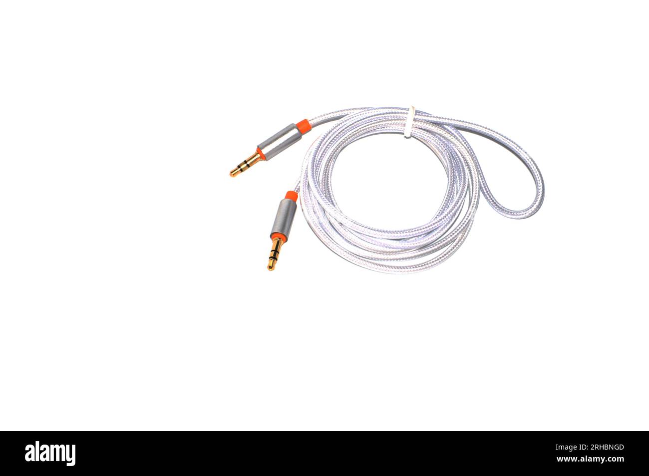 Audio cable laying on white background Stock Photo