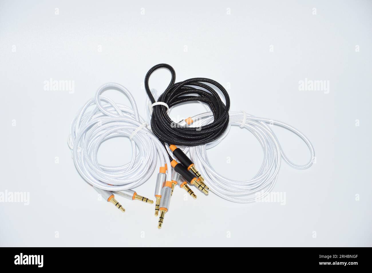 Audio cable laying on white background Stock Photo