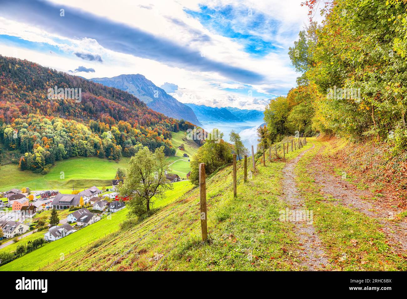 Astonishing autumn view on suburb of Hergiswil village with mountaines and fog. Poppular travel destination in Swiss Alps.   Location: Hergiswil , Can Stock Photo