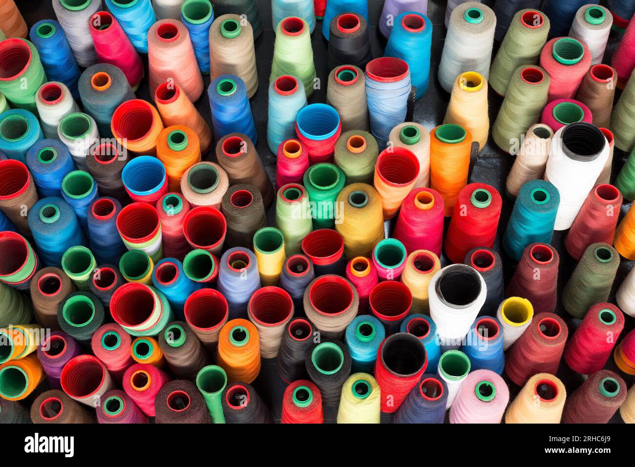 Colorful sewing threads at a weaving Stock Photo Alamy