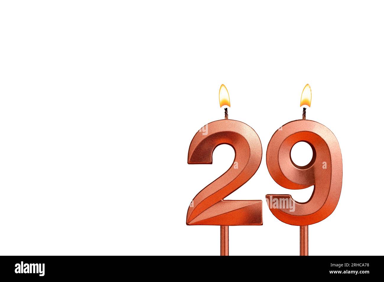 Birthday candle number 29 on white background Stock Photo