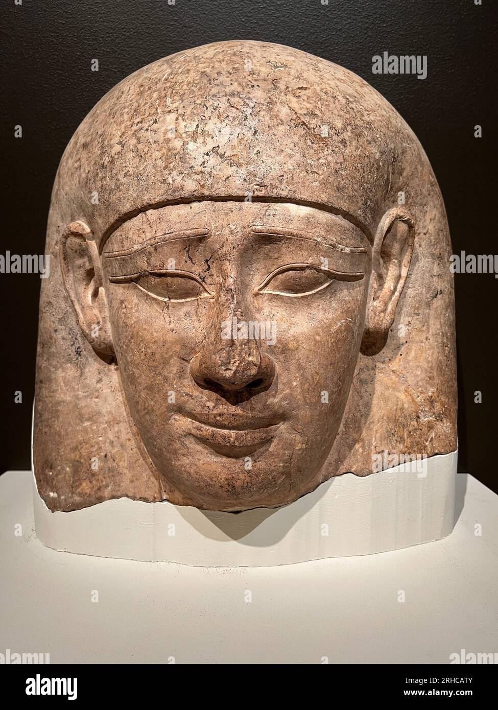 Head from a Sarcophagus Lid, Late Period-Ptolemaic Period, Dynasty 30 or later, 381-30 B.C.E. Limestone.  Brooklyn Museum, NYC Stock Photo