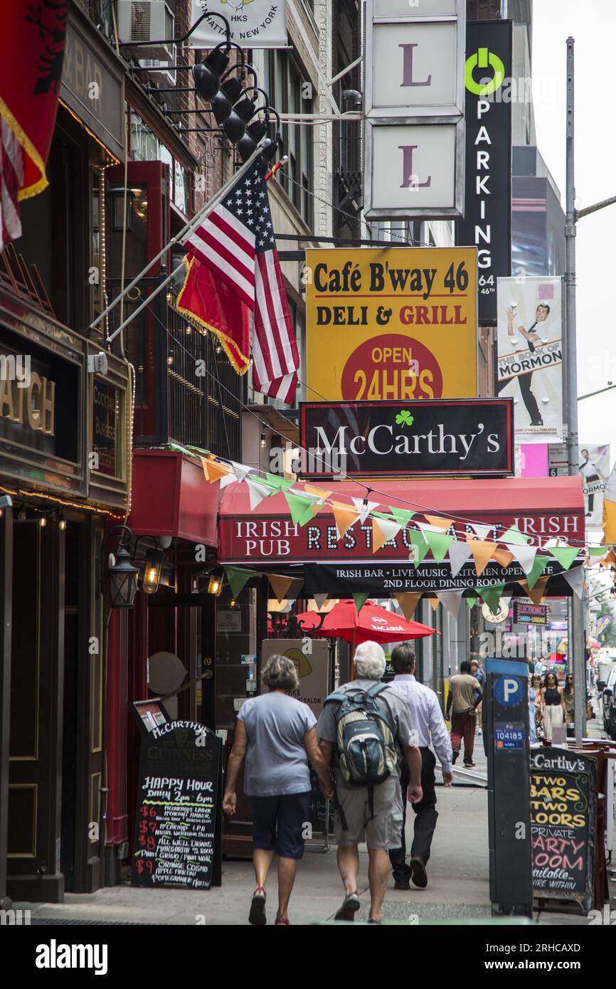 People on West 45th Street between 6th and 7th Avenues in the Times