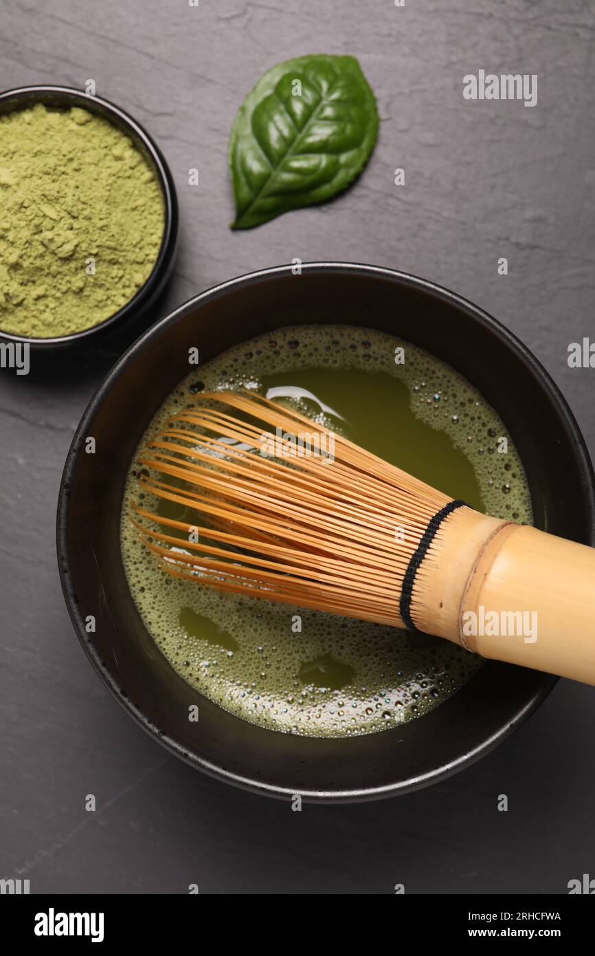 Flat lay composition with matcha tea on gray table Stock Photo
