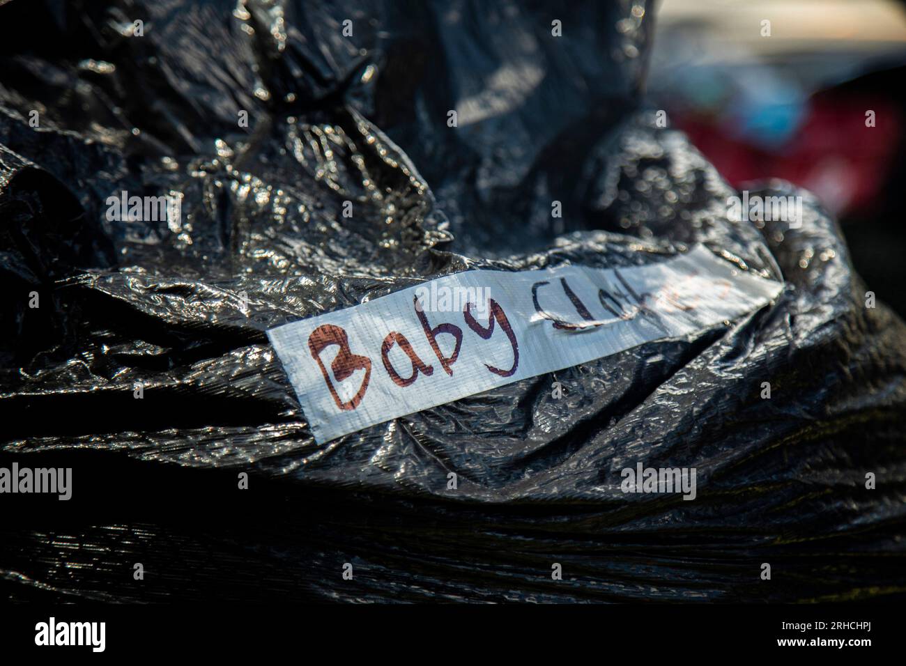 Kaneohe, United States. 13th Aug, 2023. Baby clothes are donated through a donation drop off hosted by the Single Marine and Sailor Program in the ongoing disaster relief efforts for the Maui wildfires, in Kaneohe, Hawaii, on August 13, 2023. Locals and service members donated nonperishable food, toiletries, towels, baby supplies, bedding and clothes to the refugees of the Maui wildfires. Photo by Lance Cpl. Hunter Jones/USMC/UPI Credit: UPI/Alamy Live News Stock Photo