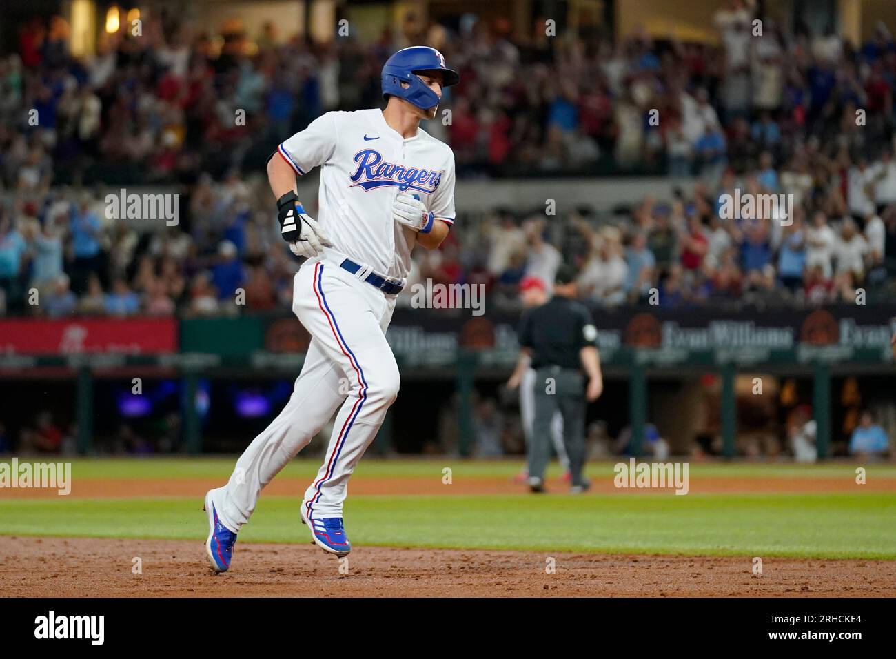 Texas Rangers' Corey Seager rounds the bases after hitting a tworun