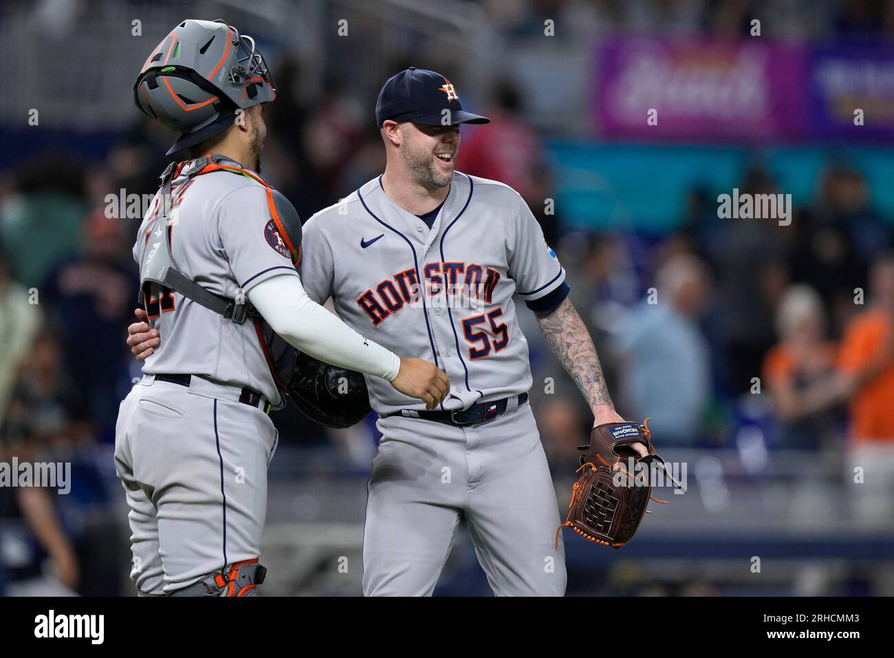 Houston Astros pitcher Ryan Pressly (55) celebrates with catcher