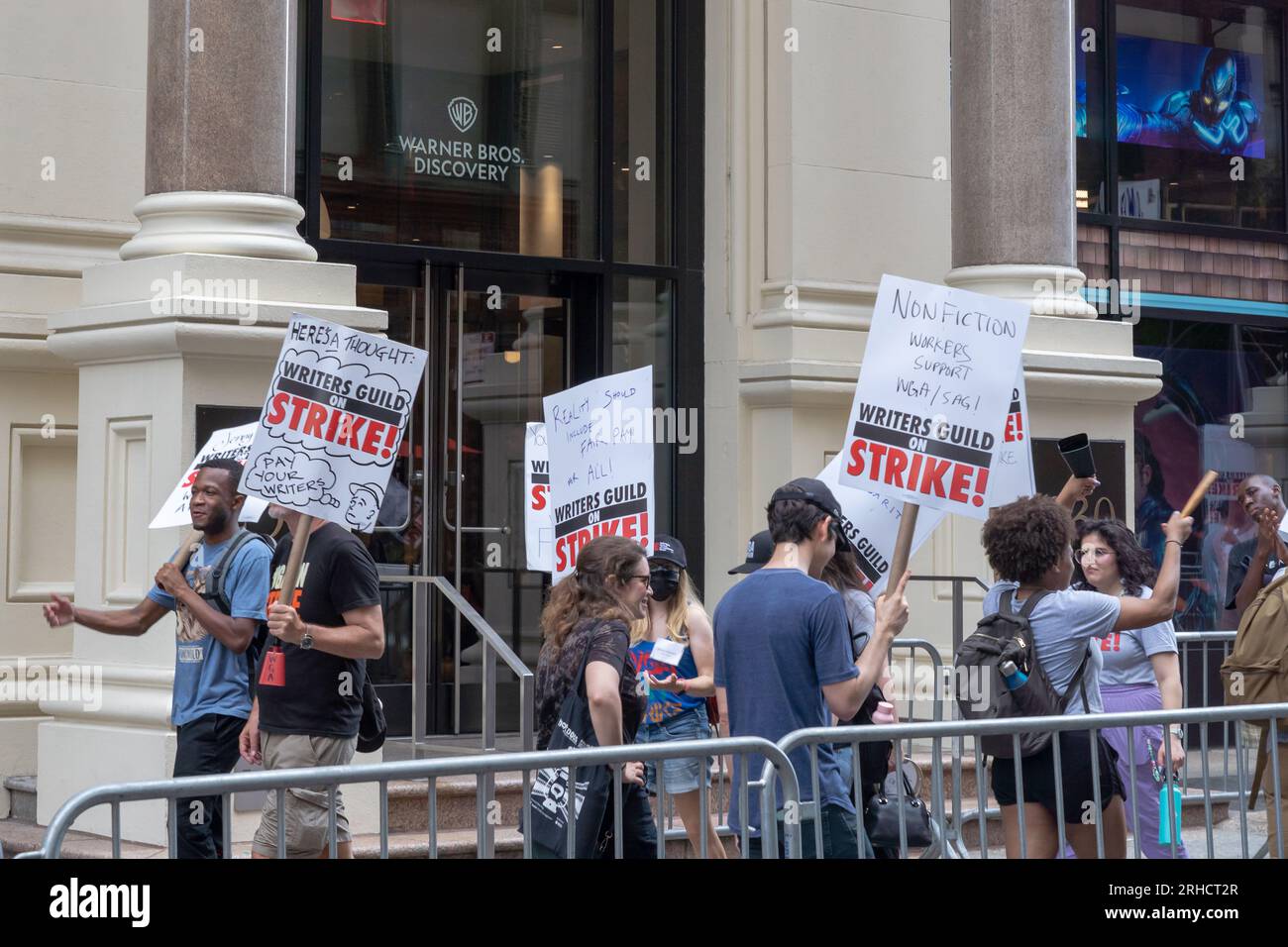 New York, United States. 15th Aug, 2023. NEW YORK NEW YORK - AUGUST 15: Striking members of Writers Guild of America and supporters walk on a picket line outside Netflix and Warner Bros./ Discovery office on August 15, 2023 in New York City. Members of SAG-AFTRA and WGA (Writers Guild of America) have both walked out in their first joint strike against the studios since 1960. Credit: Ron Adar/Alamy Live News Stock Photo