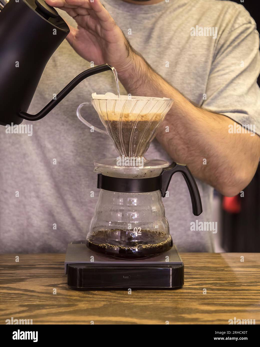 specialty coffee with a v60 brewed with boiling water and black ceramic