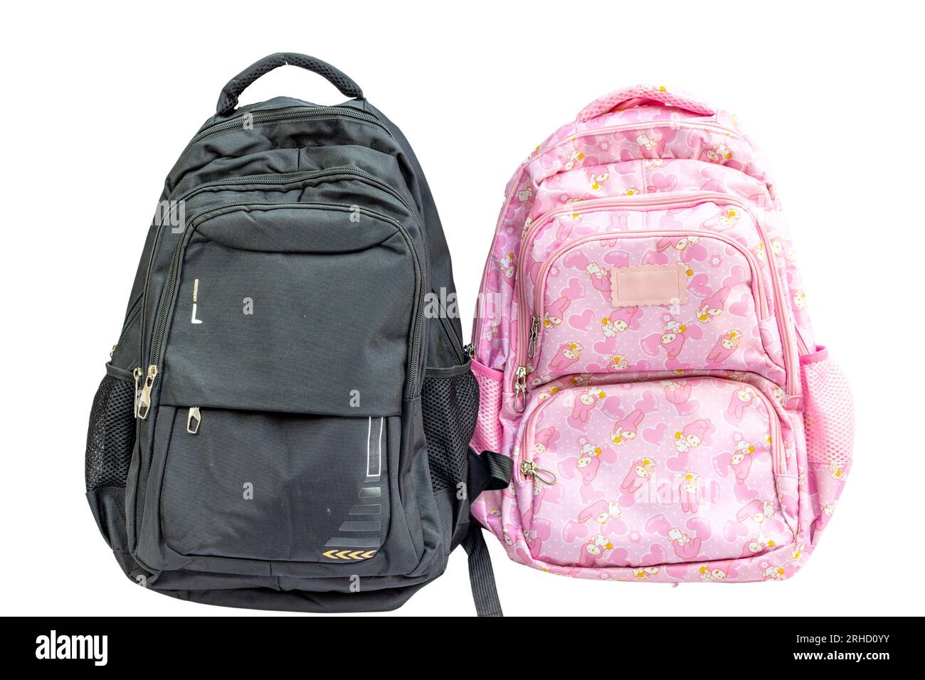 Boys and girls theme backpacks isolated on white background Stock Photo