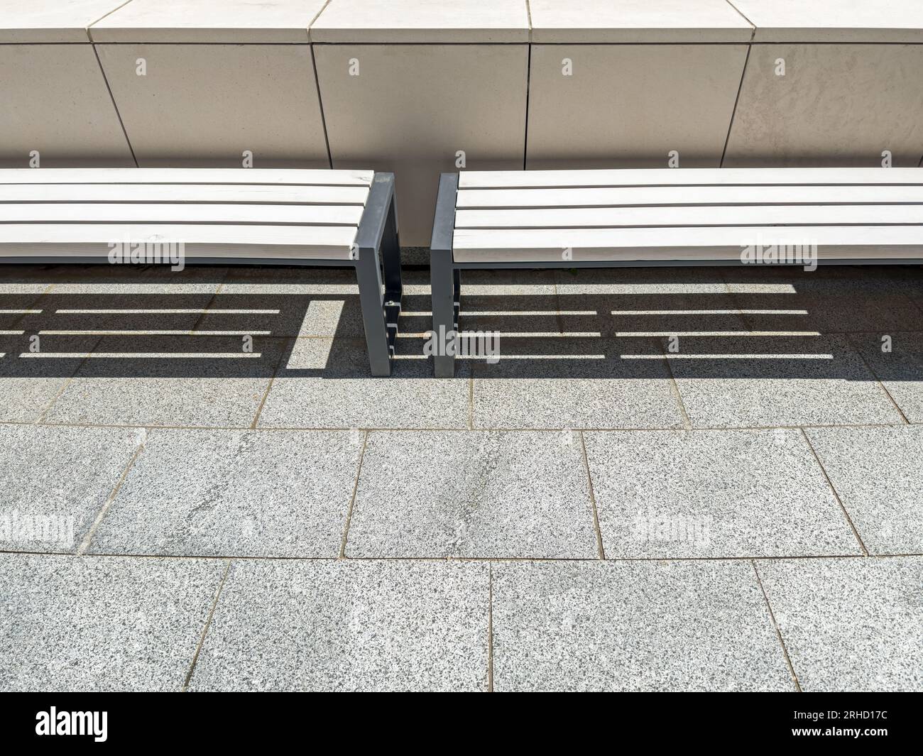 modern street bench near office building. urban architectural minimalism. Stock Photo