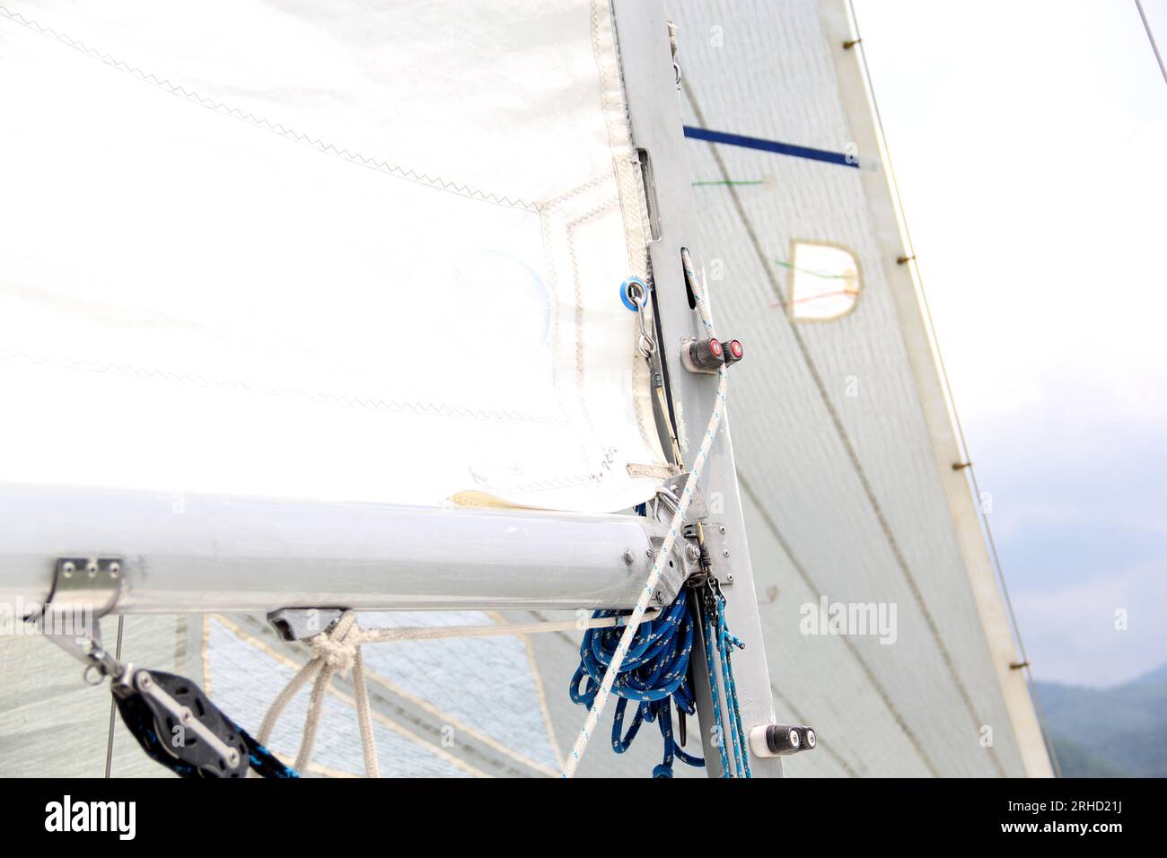 Parts of a sailboat that is sailing on the lake with sails out, bow ...