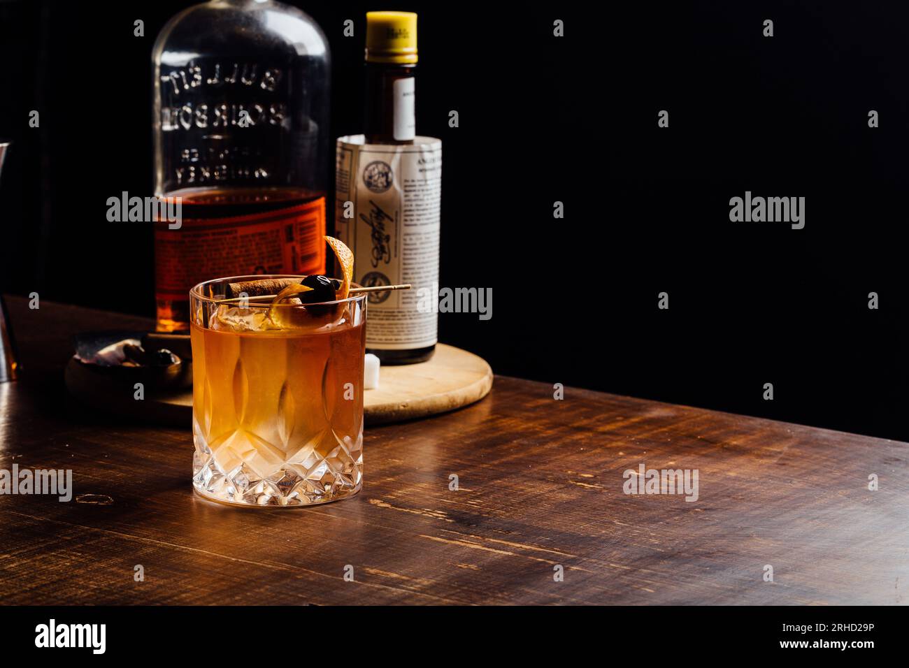 Alcoholic Old Fashioned Cocktail with bourbon whiskey, sugar and