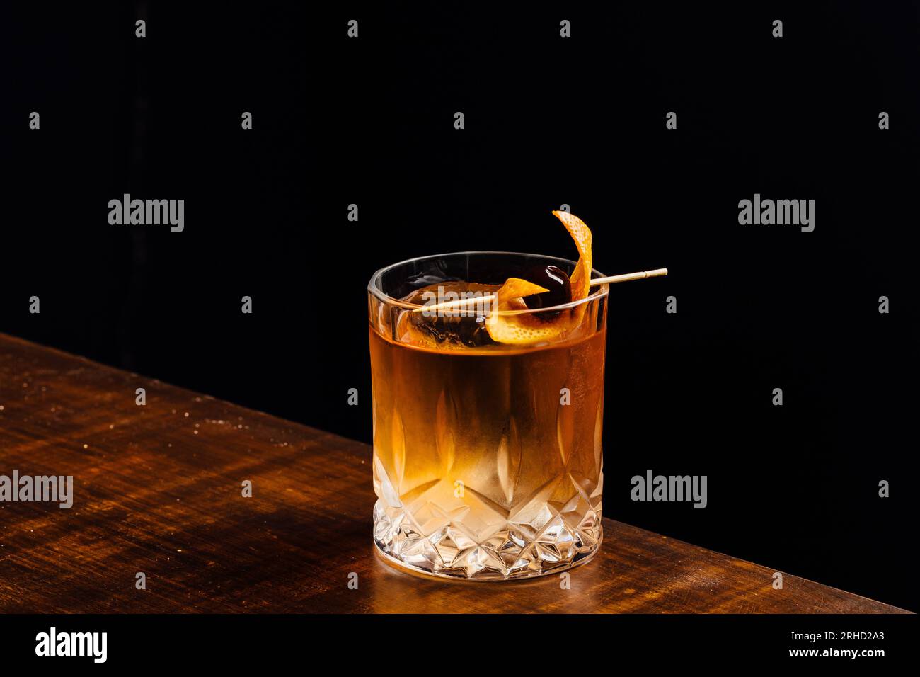 Alcoholic Old Fashioned Cocktail with bourbon whiskey, sugar and