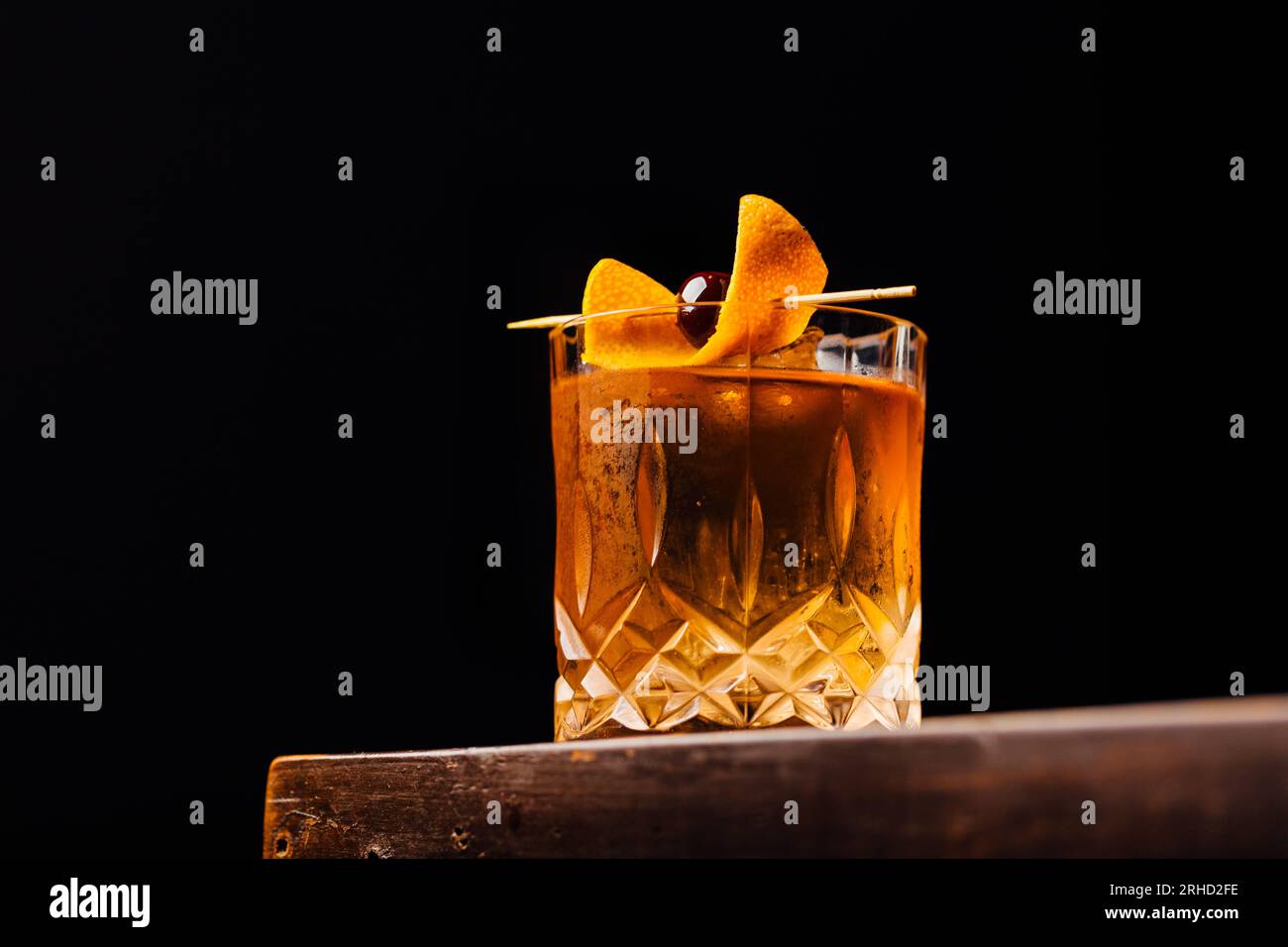 Alcoholic Old Fashioned Cocktail with bourbon whiskey, sugar and