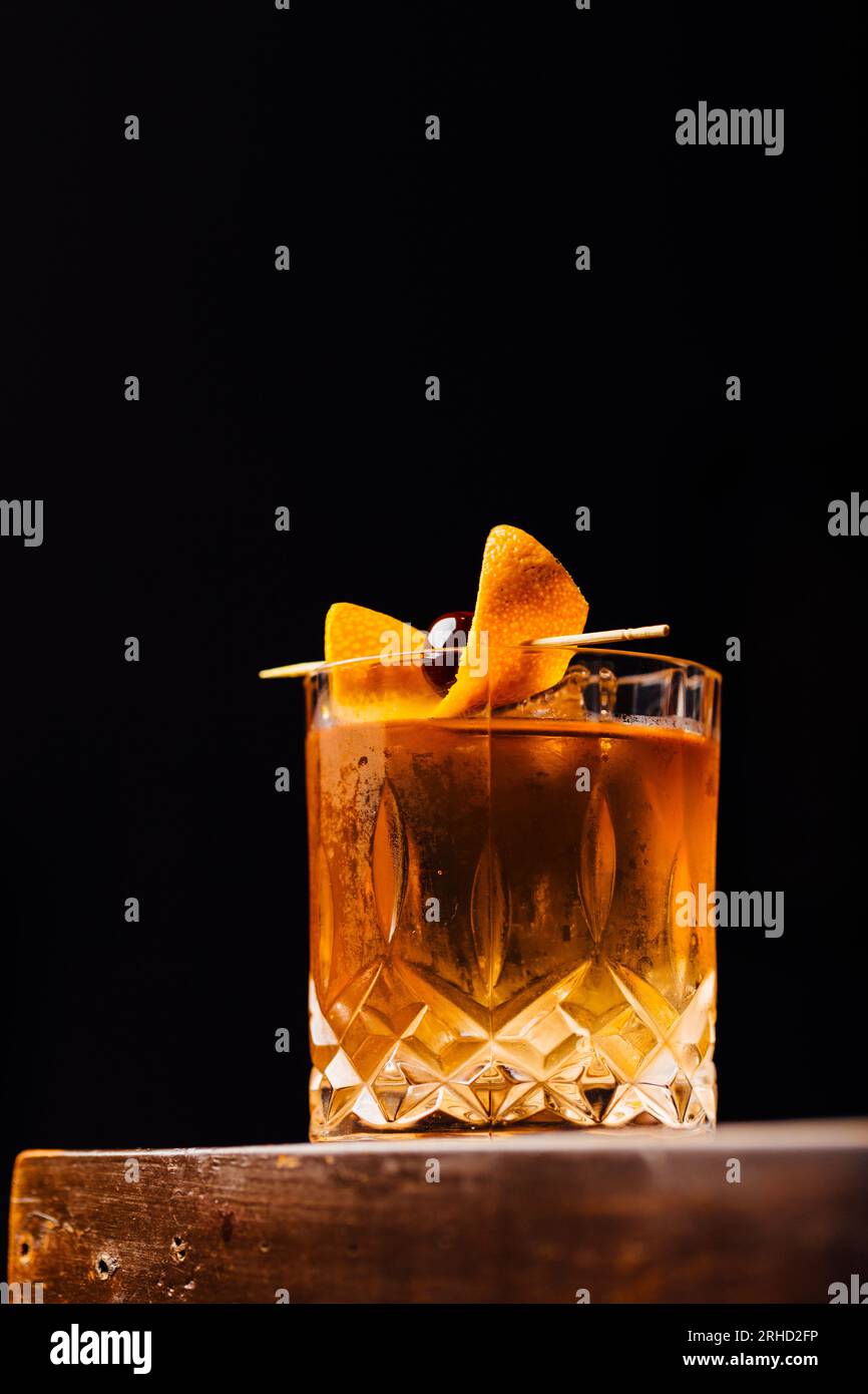 Alcoholic Old Fashioned Cocktail with bourbon whiskey, sugar and