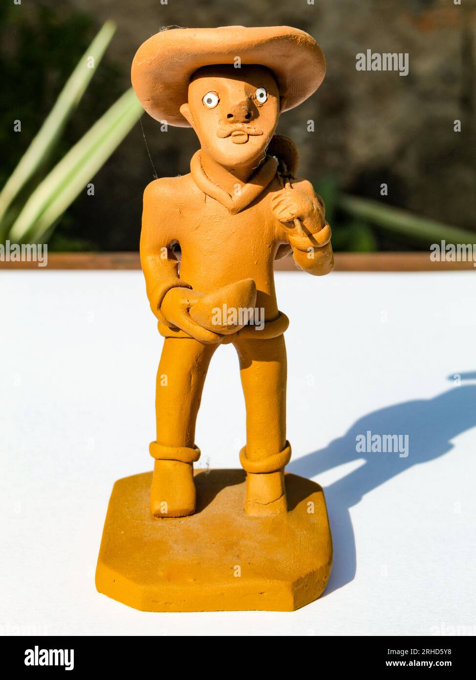 Small clay statue that portrays the northeastern man, for sale to tourists in Northeast Brazil. Stock Photo