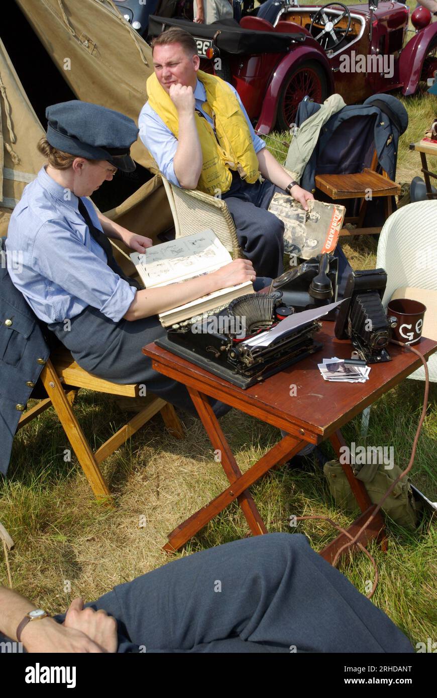 Re-enactment of pilots and other trades passing the time on a Second World War airfield during the Battle of Britain, at Biggin Hill, UK. Waiting Stock Photo