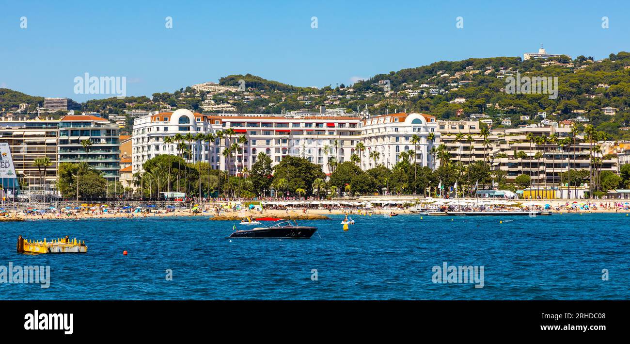 Cannes, France - July 31, 2022: Cannes city center with yacht port and marina and film festival Palace of Festivals and Congresses Stock Photo