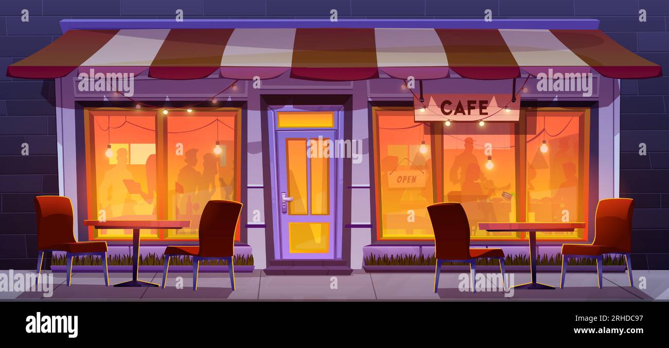 Night cafe exterior with table and chair outside. Outdoor restaurant