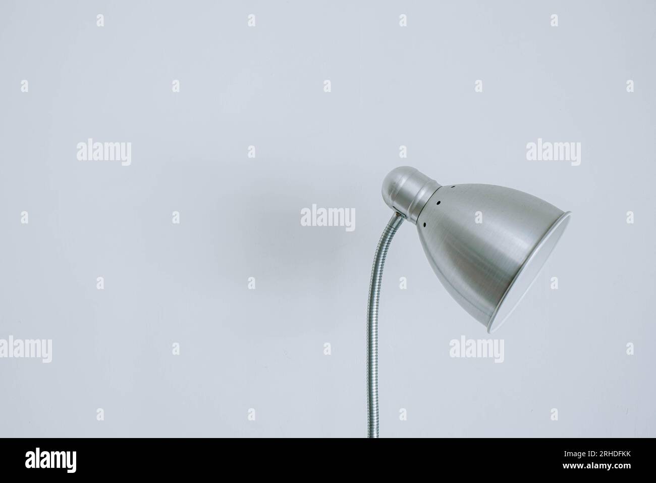 Vintage and modern metal desk lamp on isolated white background Stock Photo