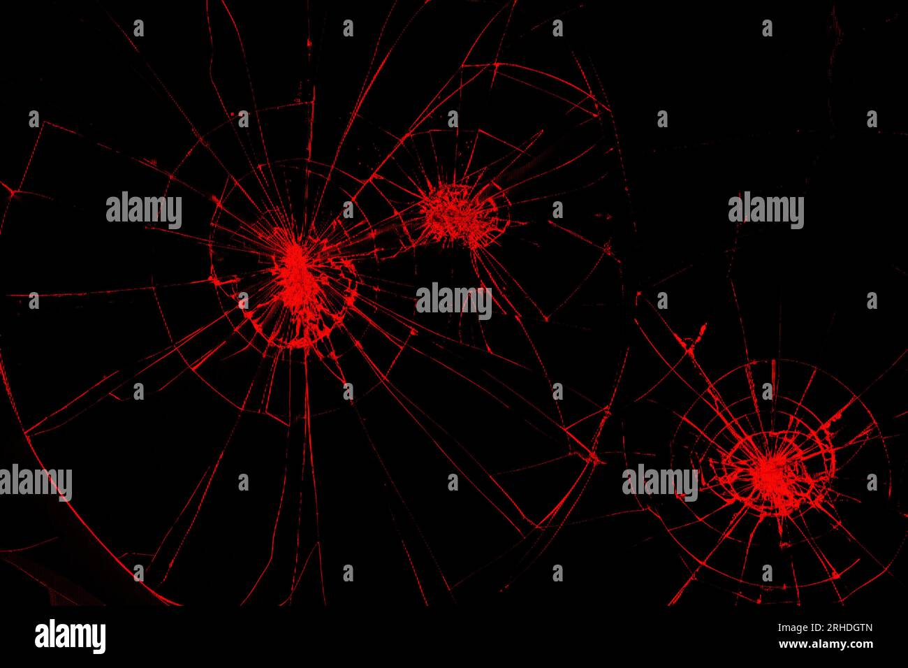 traces of bumps and cracks red color on a broken LCD screen, computer