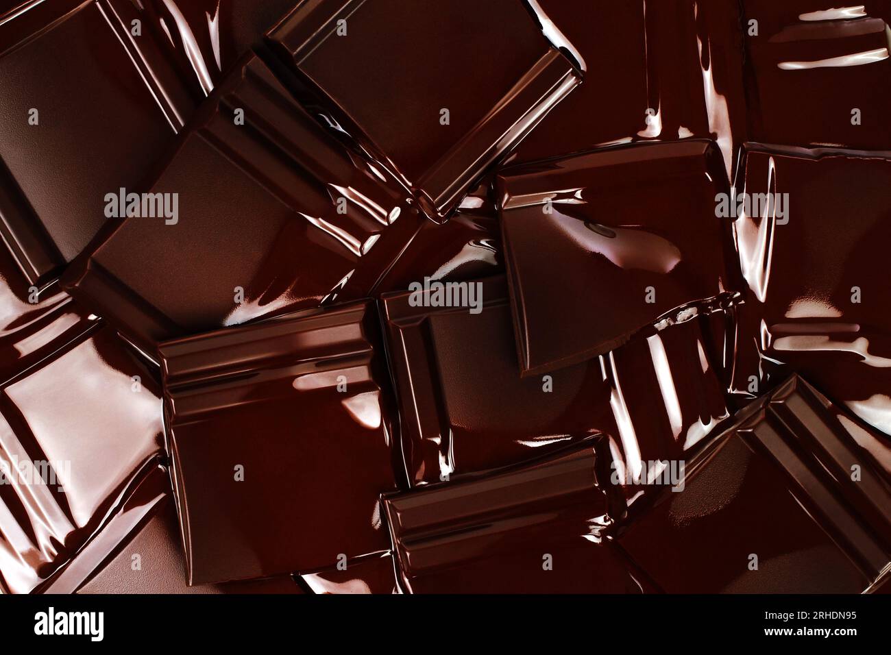 Melted Dark Chocolate Bars background close-up Stock Photo