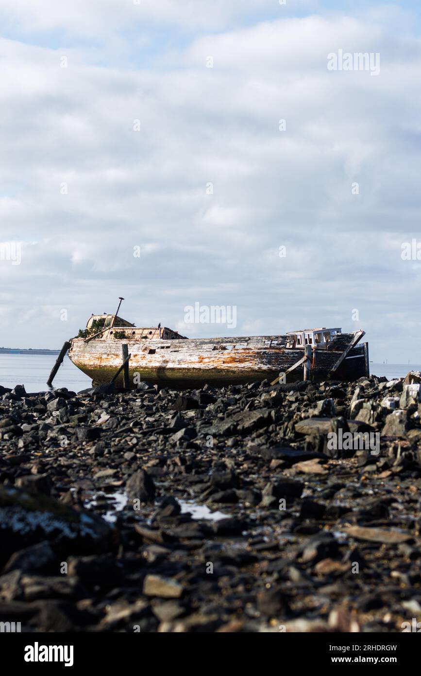 A ship wrecked boat in Bluff's ship graveyard Stock Photo