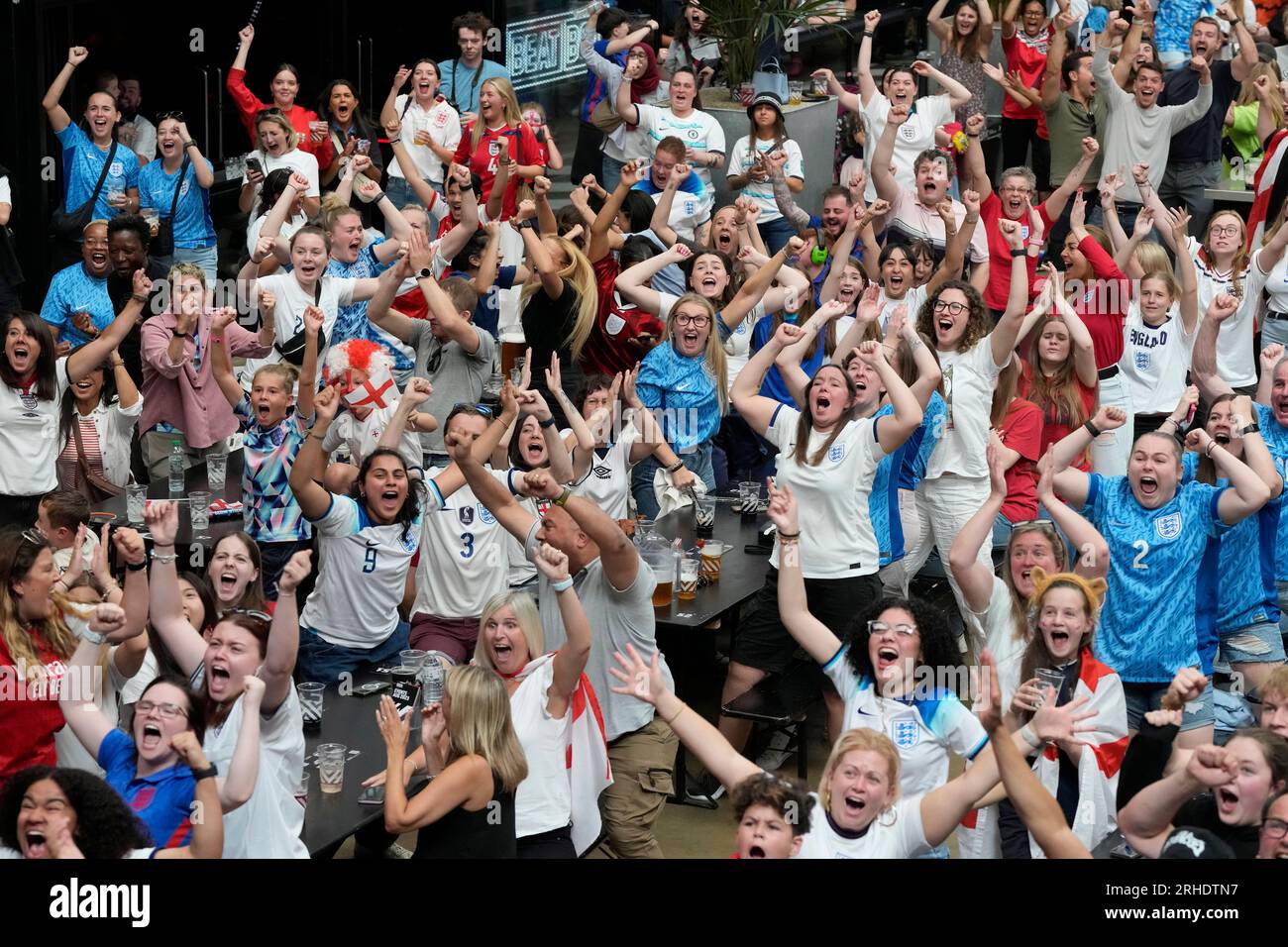 England fans cheer as England score their first goal at the screening ...