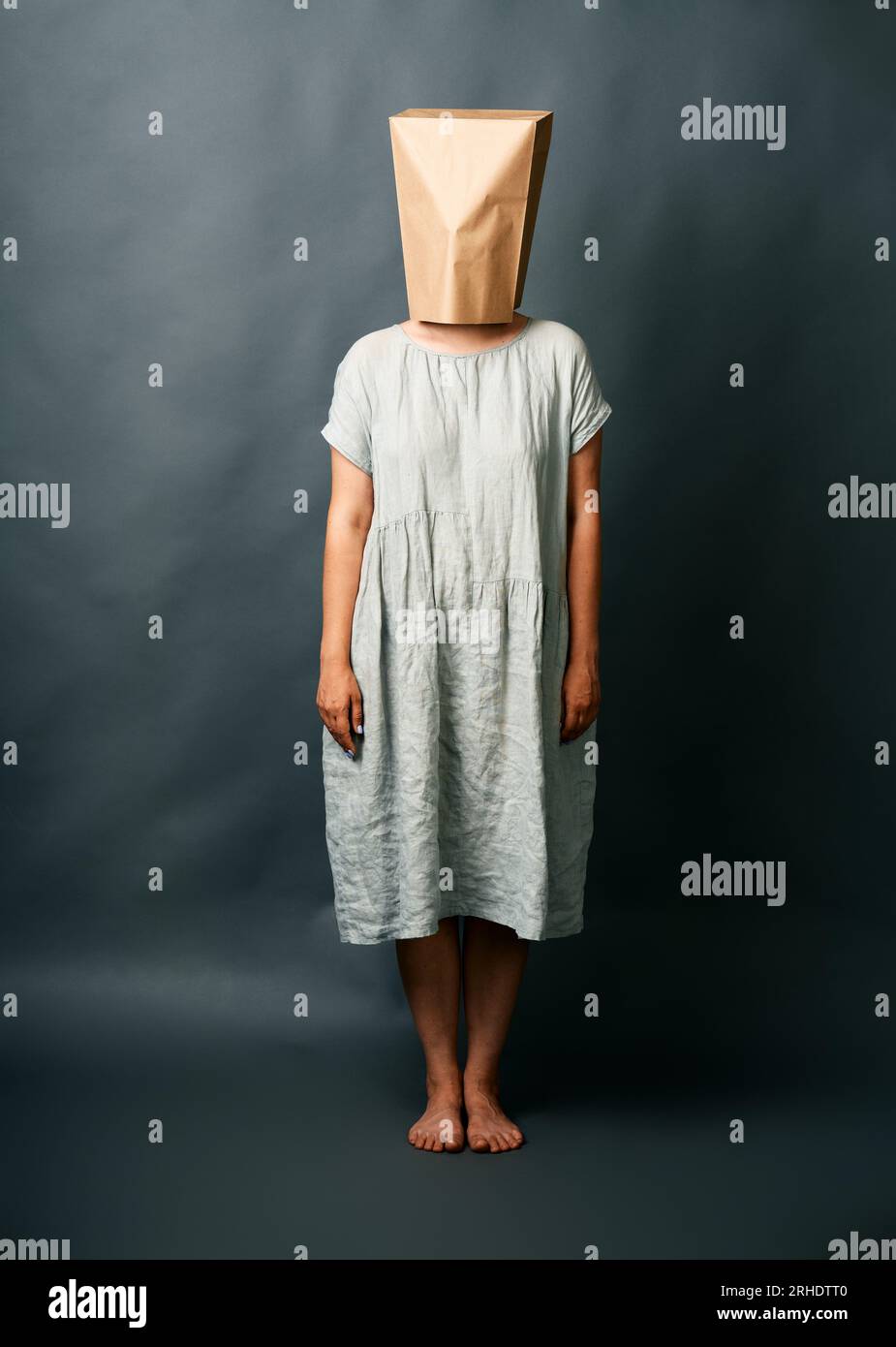 shocked paper bag girl Stock Photo - Alamy