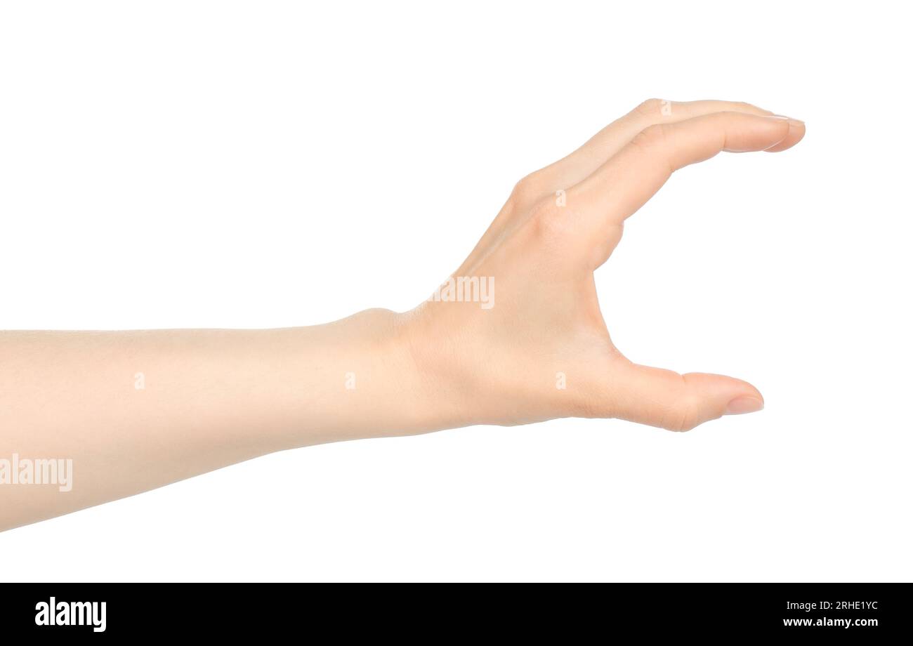 Woman hand shows virtual holding something, on white background close-up Stock Photo