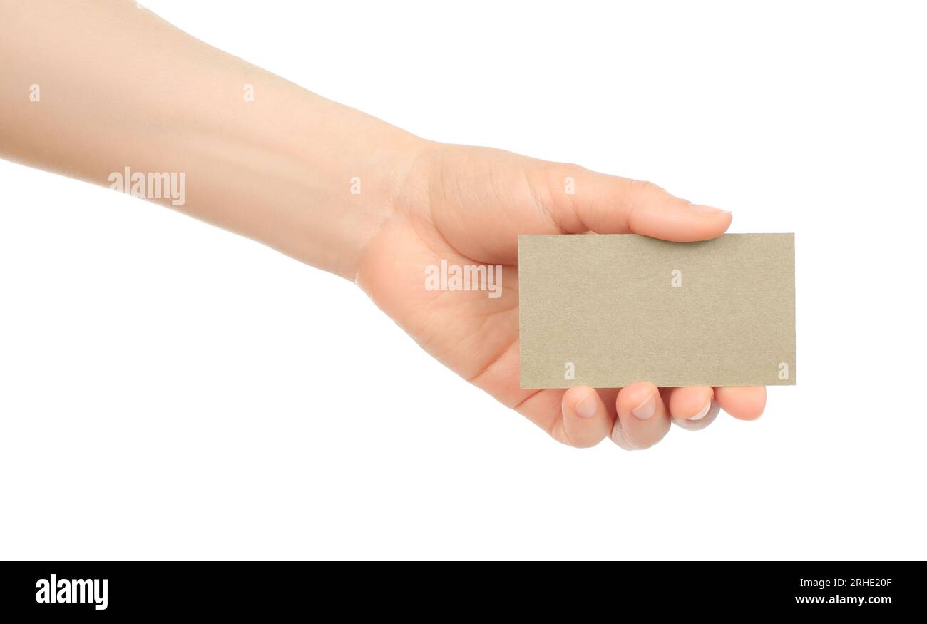 Hand holds blank business card on white background close-up Stock Photo