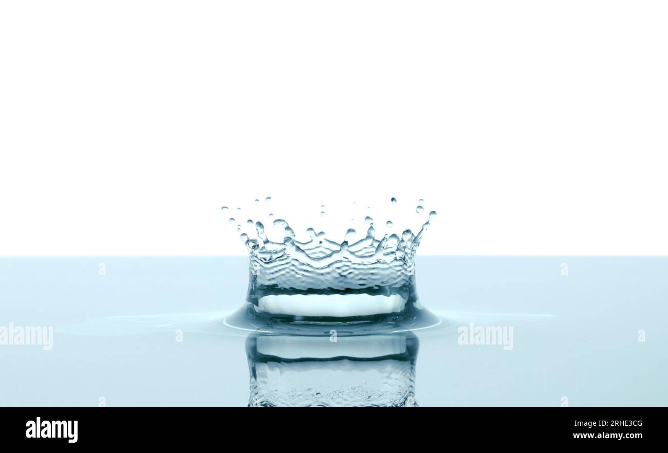Water splash like crown on white background close-up Stock Photo - Alamy