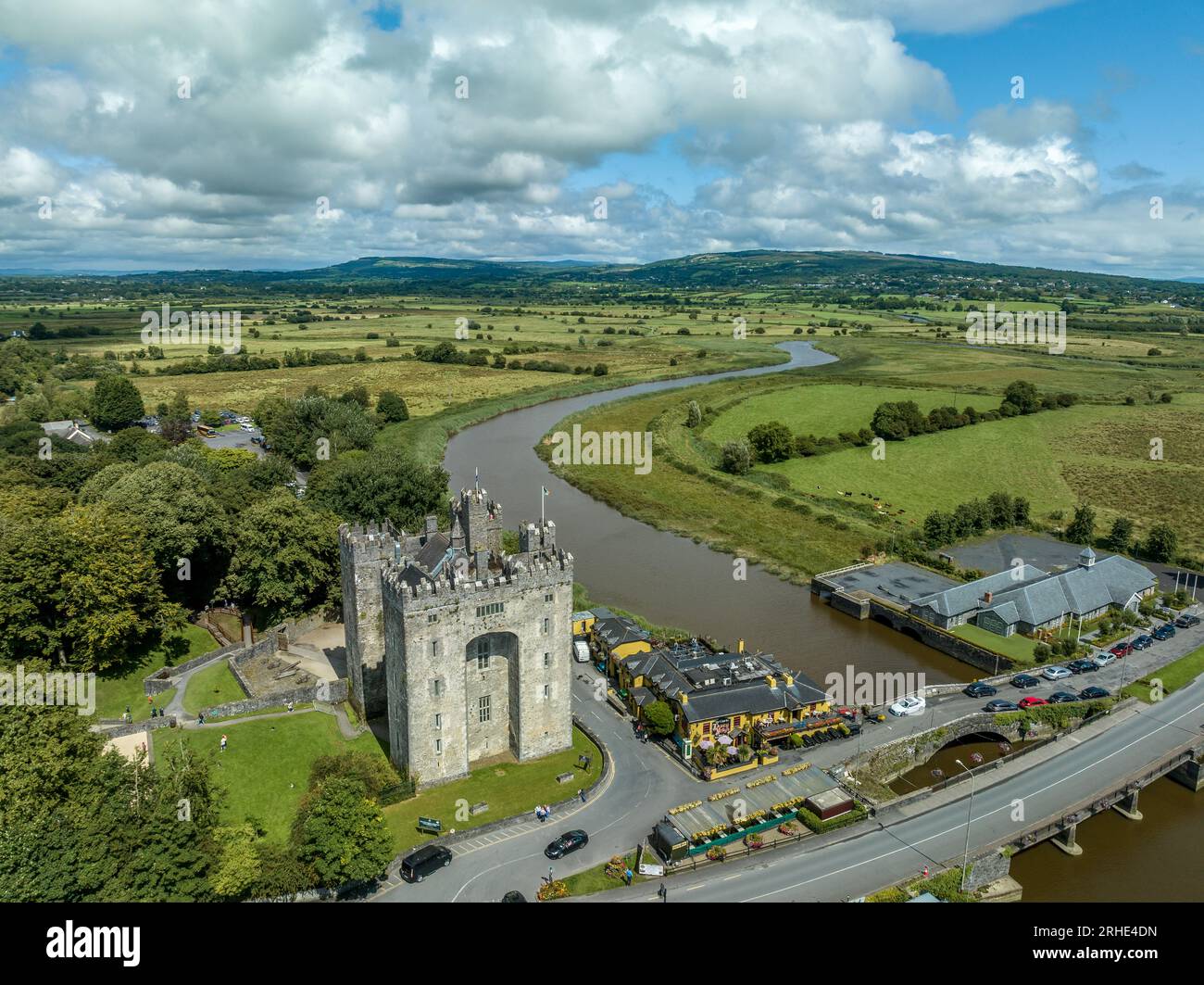 Aerial view of Bunratty Castle  large 15th-century tower house in County Clare in Ireland guarding the crossing on the Ralty river before it reaches t Stock Photo