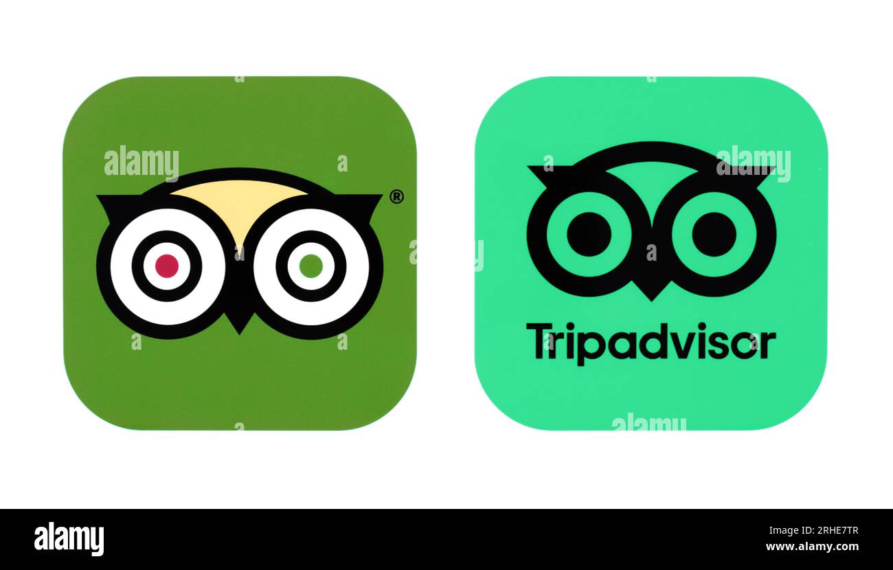 Kiev, Ukraine - August 28, 2022: Old and new Tripadvisor mobile app icons, printed on paper. Tripadvisor is an American online travel company that ope Stock Photo