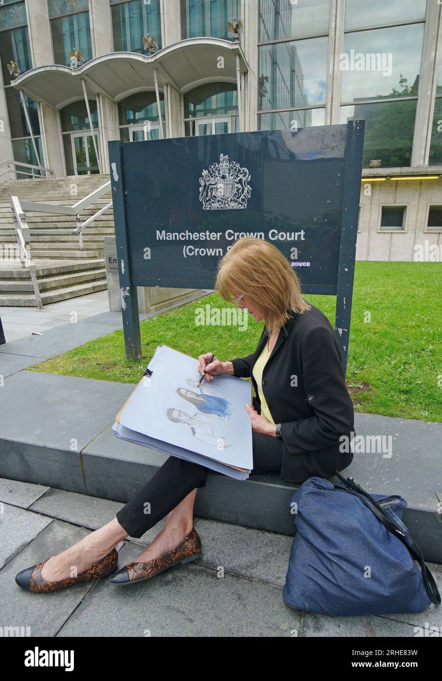 Court artist Elizabeth Cook drawing outside Manchester Crown Court ...