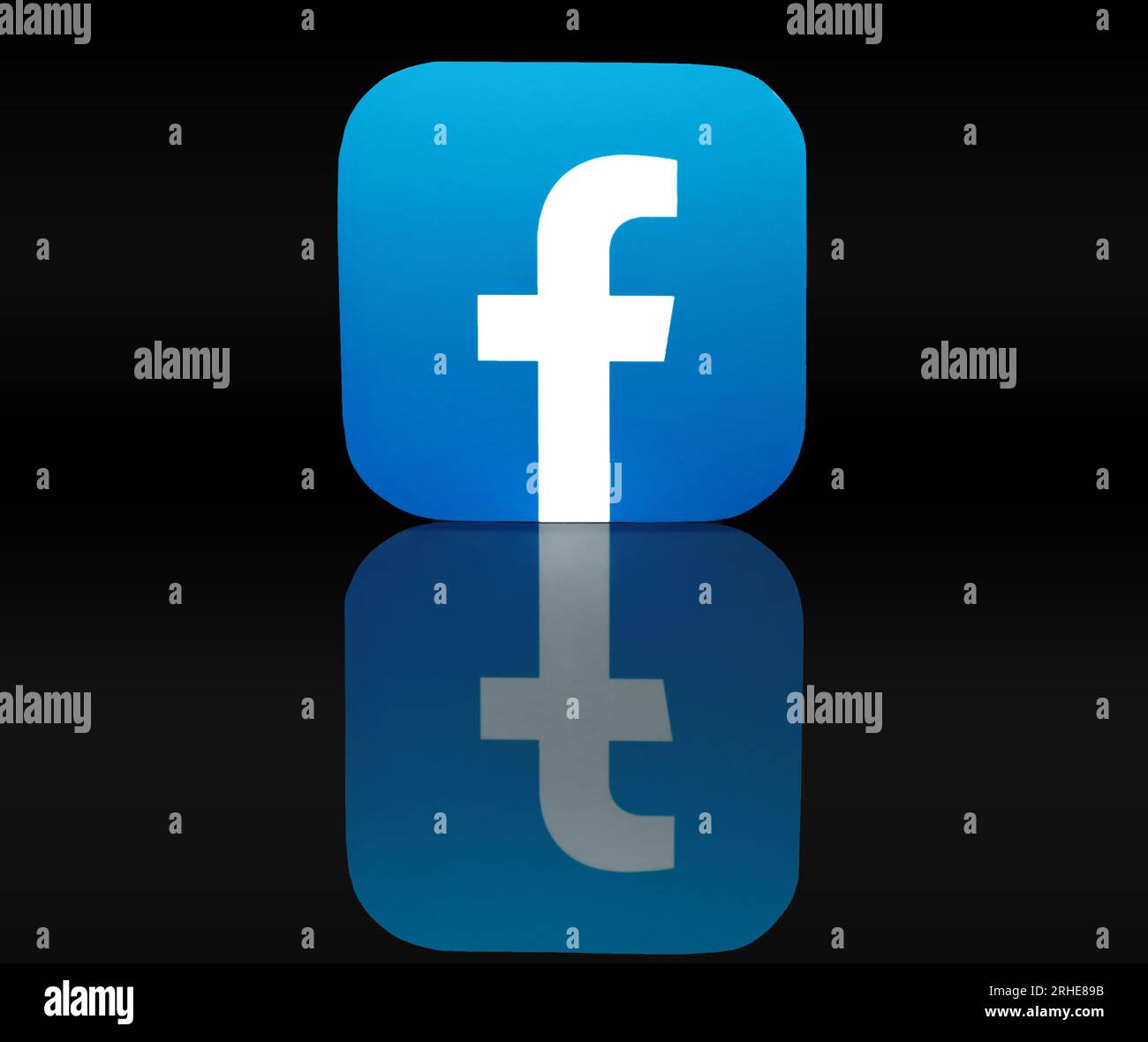 Kiev, Ukraine - September 19, 2022: Facebook paper icon with reflection on black background. Facebook is an online social media and social networking Stock Photo