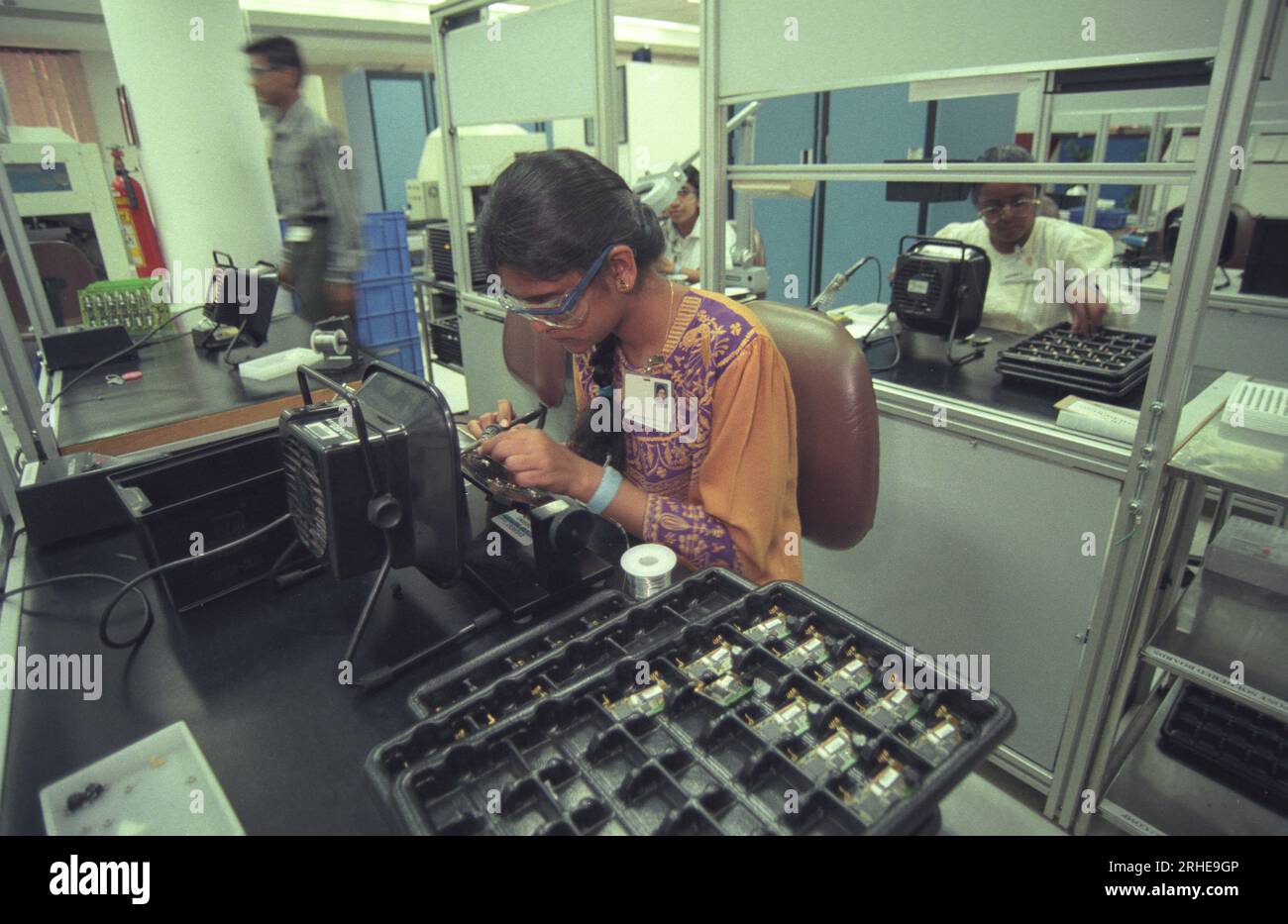a Factory and Productions of Pager at the Electronic City in the city of Bangalore in the Province Karnataka in India.  India, Bangalore, April, 1998 Stock Photo