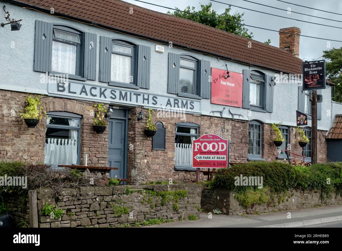 Alvington village in the Forest of Dean Gloucestershire UK. The Blacksmiths Arms pub on the A38 between Chepstow and Gloucester. Stock Photo