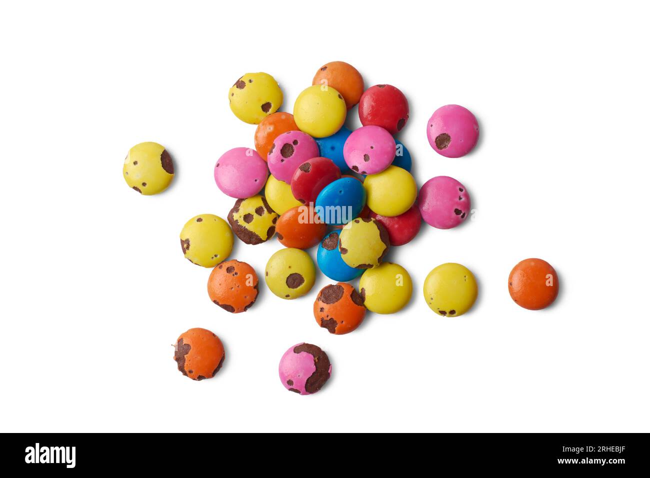 pile of spoiled, expired or bad colorful candies, due to improper storage, exposure to moisture or contamination, sweets that are unappetizing Stock Photo