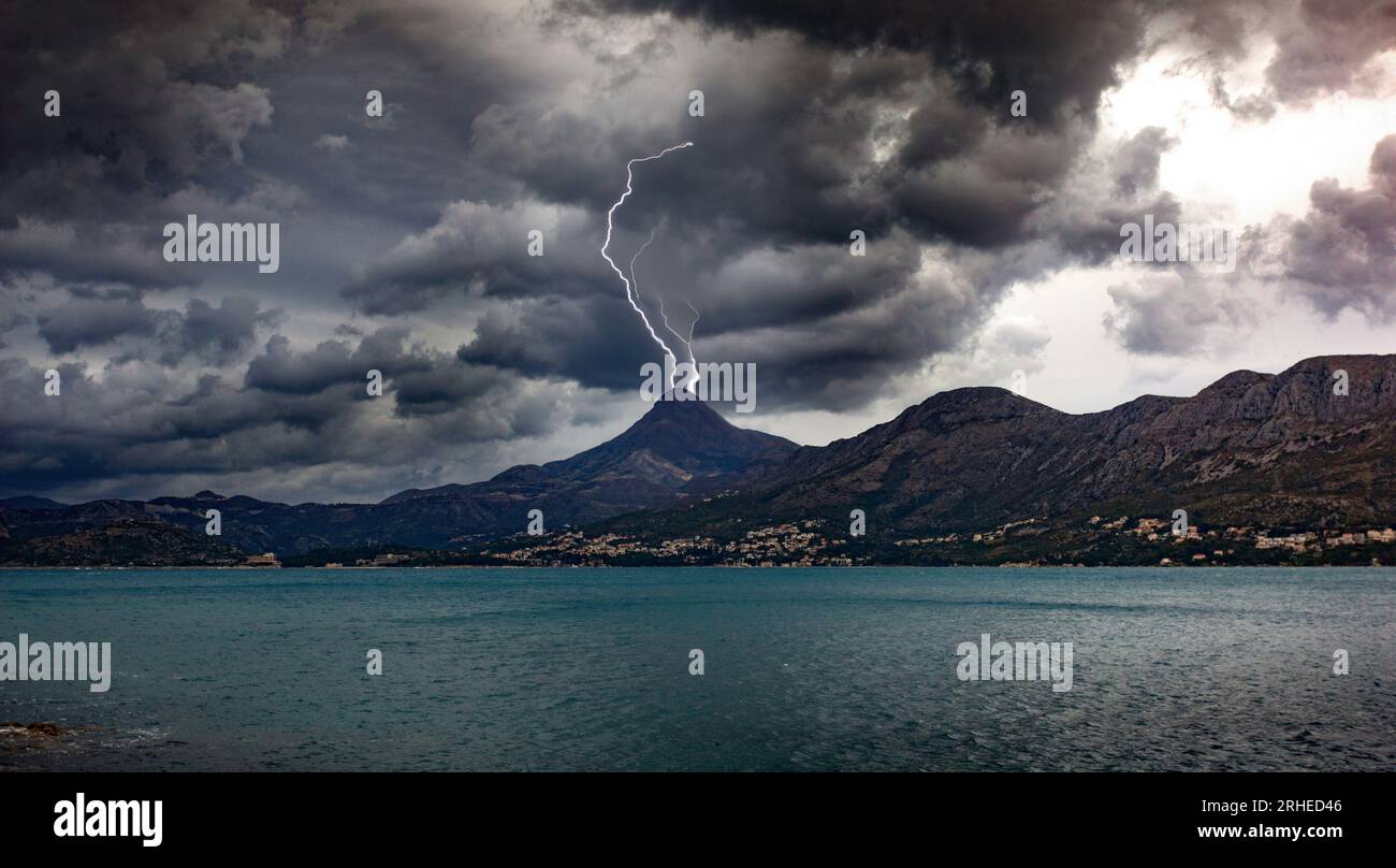 Dramatic dark stormy sky and lightning over a sea Stock Photo - Alamy