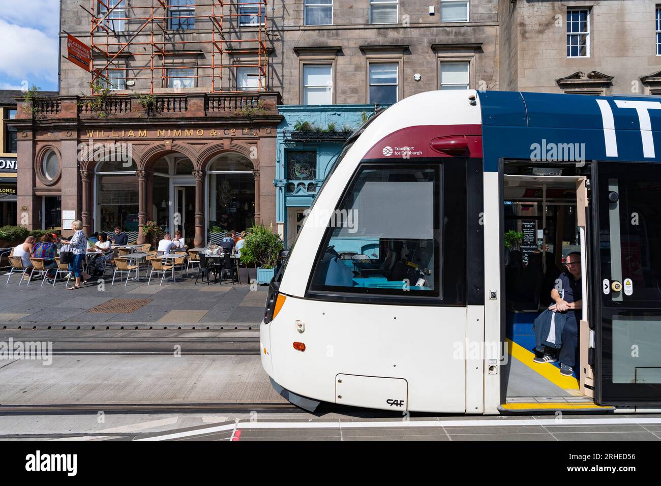 Edinburgh tram at The Shore stop on Constitution Street in Leith