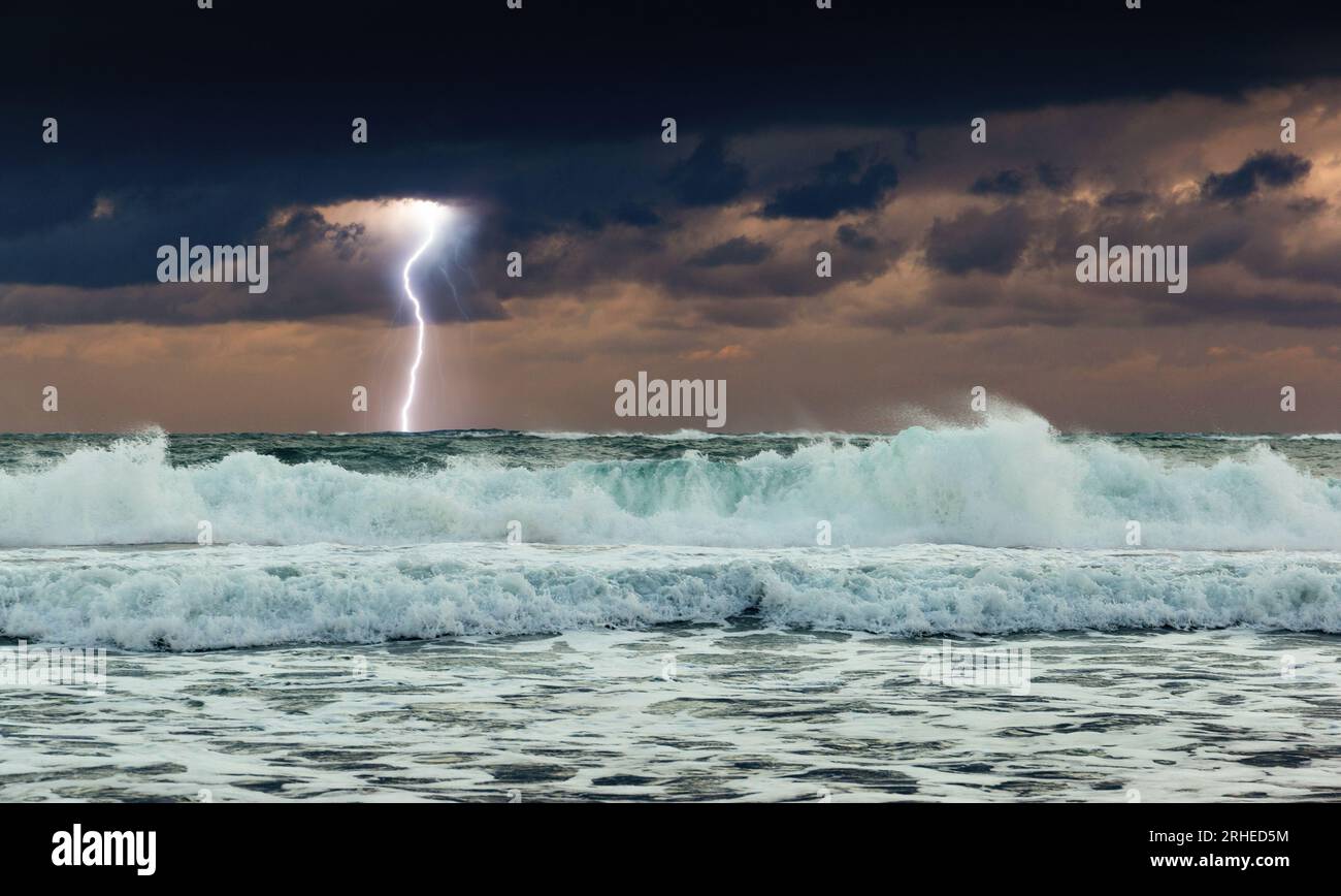 Dramatic dark stormy sky and lightning over a sea Stock Photo - Alamy
